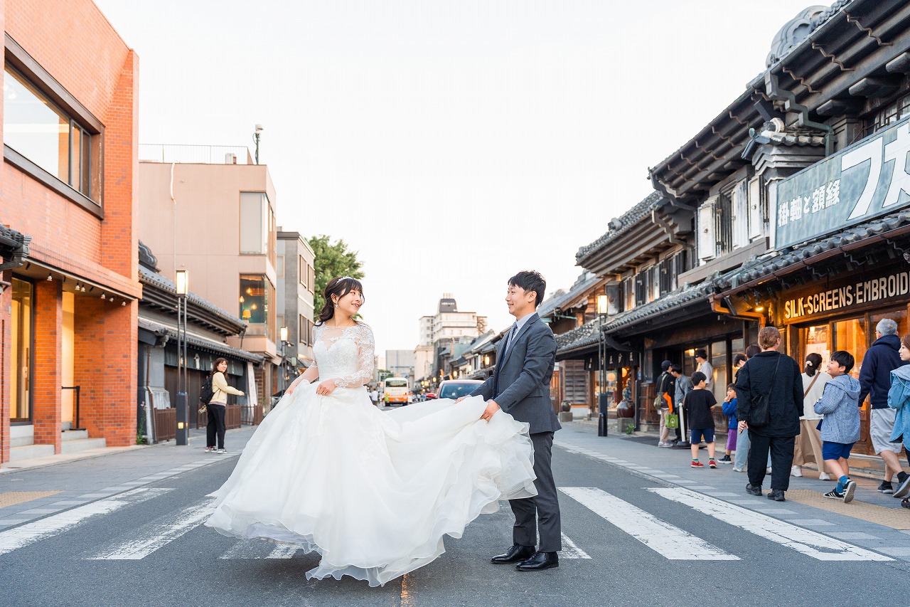 Kawagoe photoshoot bride and groom standing on a quiet street in Little Edo