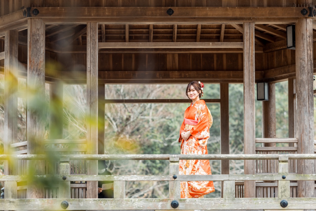 Nara Park veranda walkway portrait – kimono framed by temple architecture