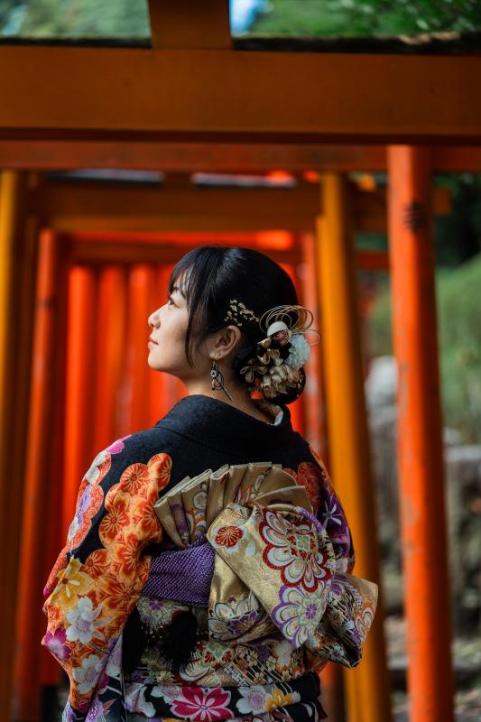 Tokyo shrine torii tunnel portrait - profile close-up, soft light
